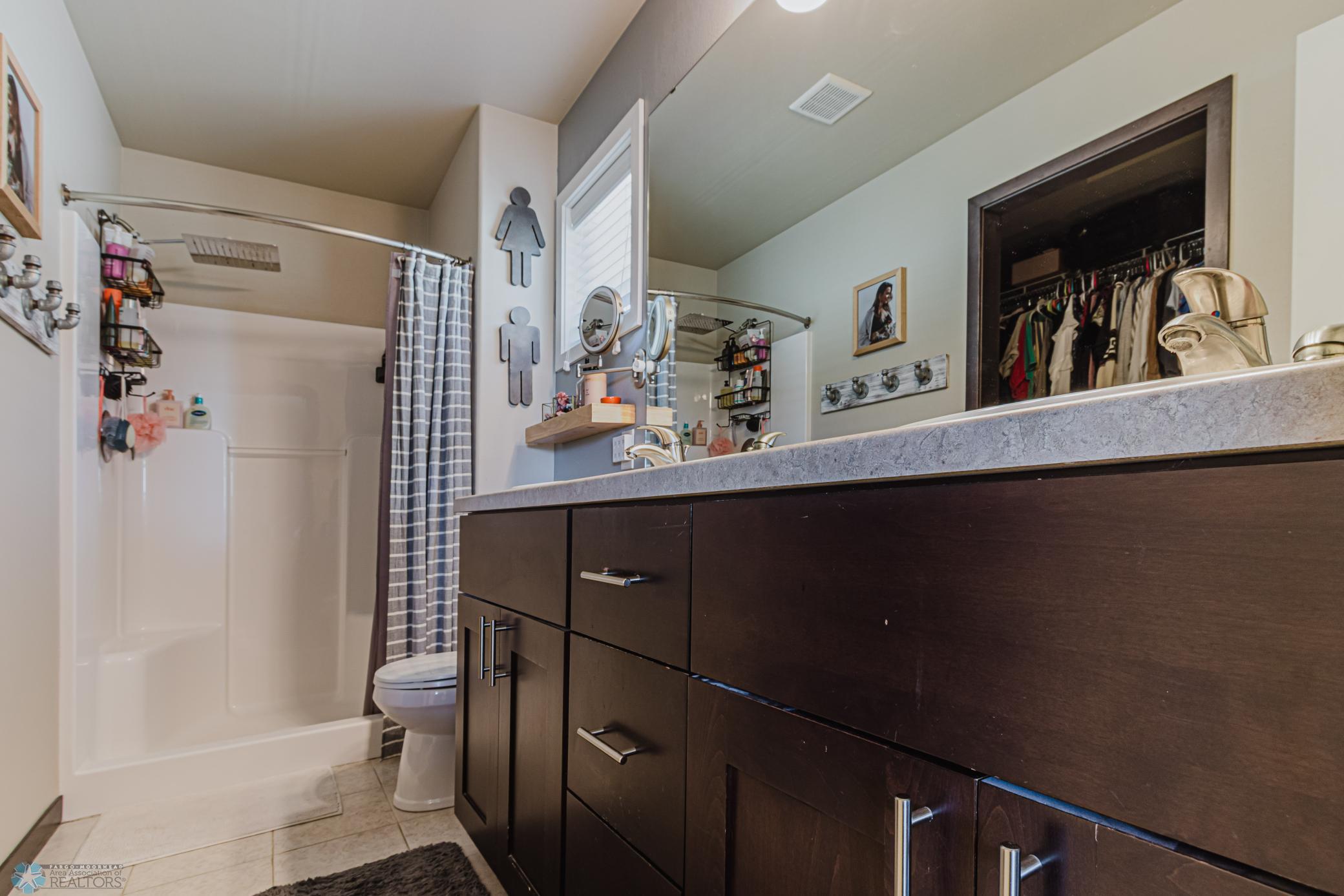 Primary 3/4 bath with dual sinks and large vanity
