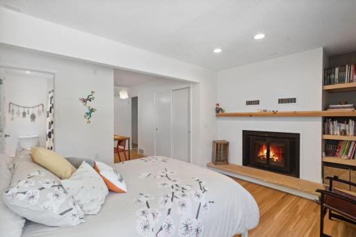 This bedroom is complete with a fireplace, an en suite bathroom and ample space for a desk or hobby space.
