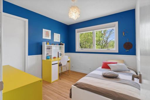 The third bedroom on the main floor is cozy and charming equipped with a good size closet.