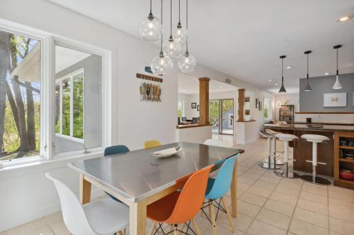 Casual dining room, perfect for everyday meals with beautiful views of nature.
