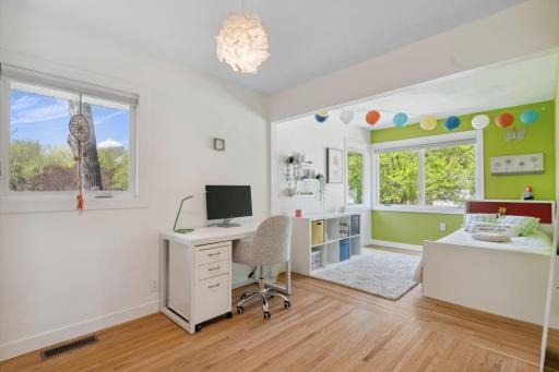 The second bedroom on the main floor is also very spacious and filled with natural light.