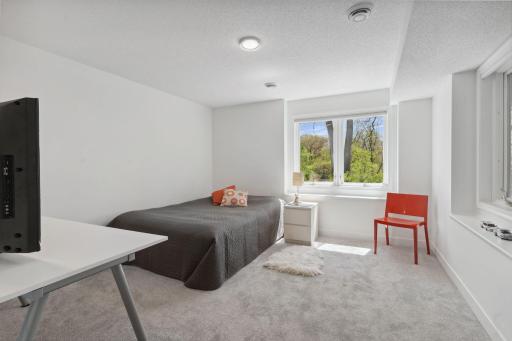 Bright second bedroom downstairs, filled with natural light and ready to make it your own!