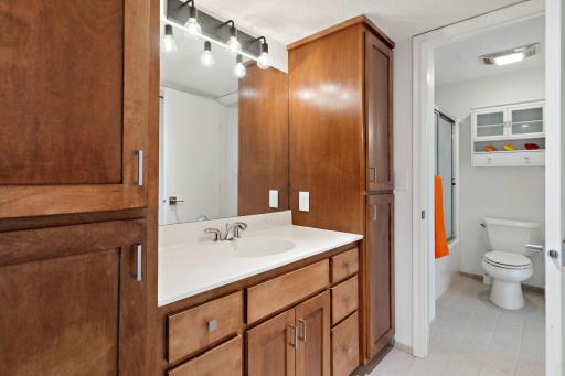Jack and Jill bathroom connecting the two bedrooms downstairs , offering convenience and privacy.