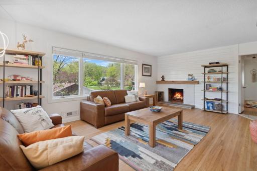 The living room provides additional space on the main level for everyday comfort or entertaining.