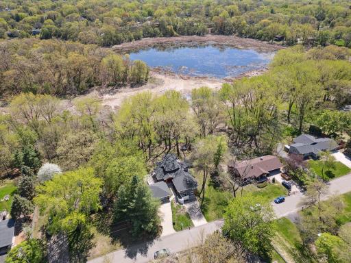 Aerial view of the home and Lake Rose , offering opportunities for kayaking and cross-country skiing