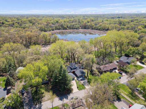 Aerial view of the home and Lake Rose , offering opportunities for kayaking and cross-country skiing.