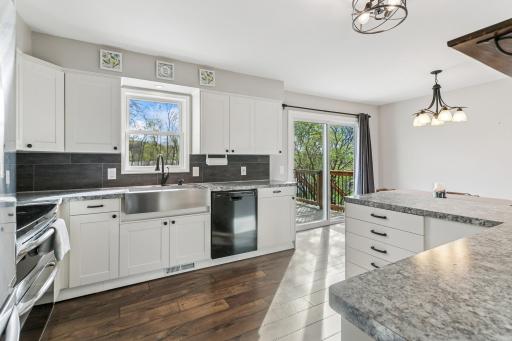 Kitchen window that overlooks the large backyard~