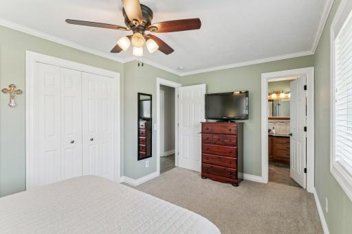 The full bathroom walks through to the primary bedroom~