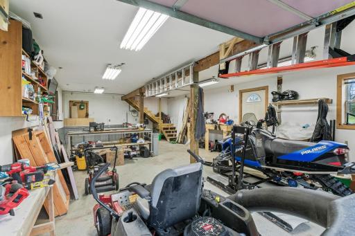 The shop also has an unfinished upper level (full) that can be used for extra storage or future finished square feet~