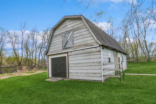 Large outbuilding/shop with in-floor heat, 100 amp service with separate on/off peak meter and electric heat~