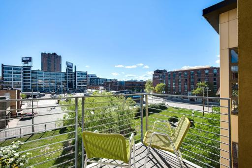 Second balcony overlooking the awesome green space out front! You'll love watching the stunning city lights come to life!