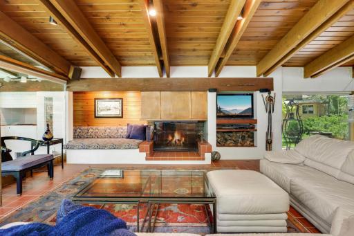 Gorgeous wood burning fireplace in living room.