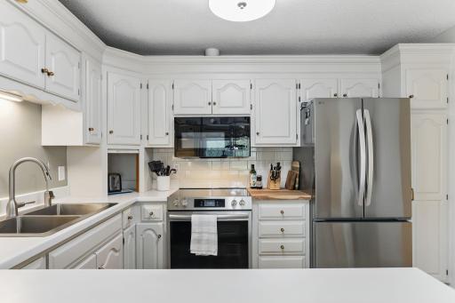 Updated stainless steel appliances make this kitchen as practical as it is attractive.