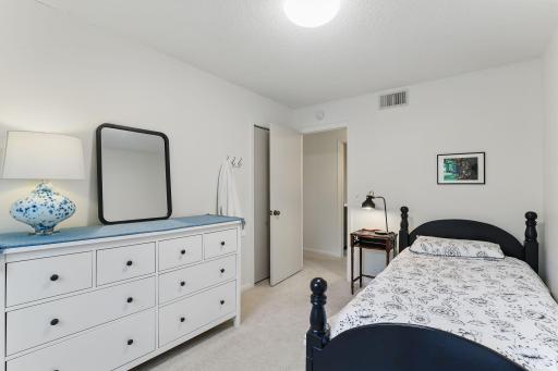 Second of three main-level bedroomsâbright, comfortable, and move-in ready.