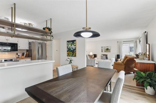 Open view from the dining room into the kitchen and living roomâgreat flow for everyday living and entertaining.