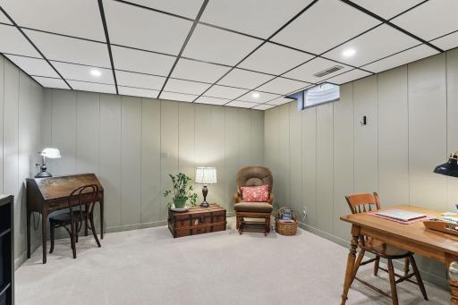 This lower-level room offers flexibility for a home office, craft room, or guest retreat.