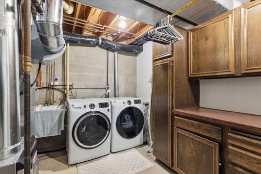Utility area with brand-new washer and dryer, plus a new furnace and AC installed in 2024âbig-ticket updates already done!