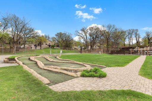 Unique community small mini golf area adds a playful touch to this amenity-filled neighborhood!