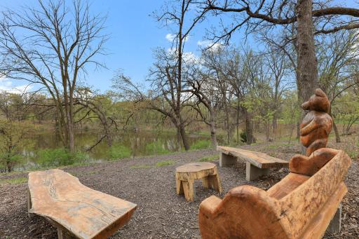Scenic walking trails and peaceful sitting areas wind through the large developmentâideal for enjoying nature and connecting with neighbors.