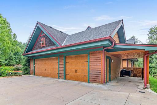 Attached garage with additional covered parking