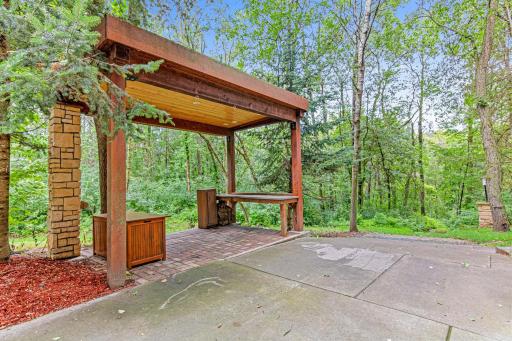 Covered workspace off shed near Studio