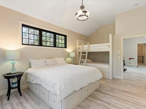 Guest suite with built-in bunk beds, and a deck connecting to the other room.