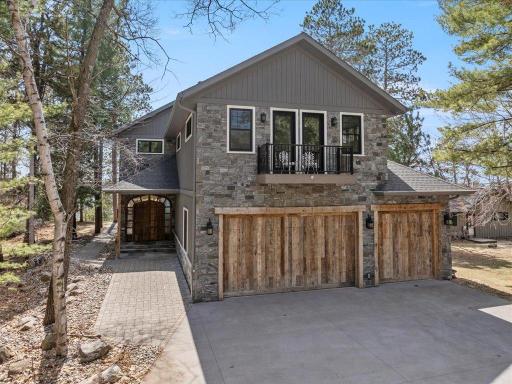 Oversized 3 car garage and concrete driveway for plenty of guest parking.