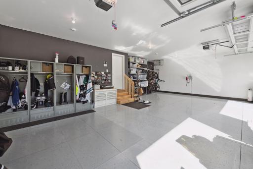 The sellers upgraded the garage with a gas heater and durable epoxy flooringâcombining comfort and style in a practical space.