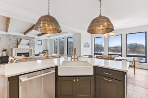 Enjoy quartz countertops and a timeless farmhouse sink.