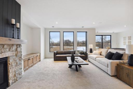 Take in long, beautiful views of the wetland and pond right from the back of the home.