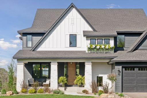 A custom-built modern farmhouse blends timeless charm with contemporary designâfeaturing clean lines, rustic accents, and warm, inviting details throughout.