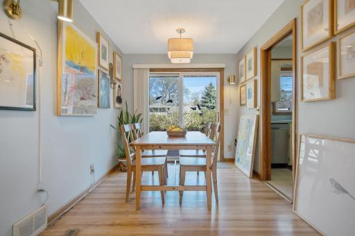 Dining Room with Sliding Glass Door onto backyard Deck
