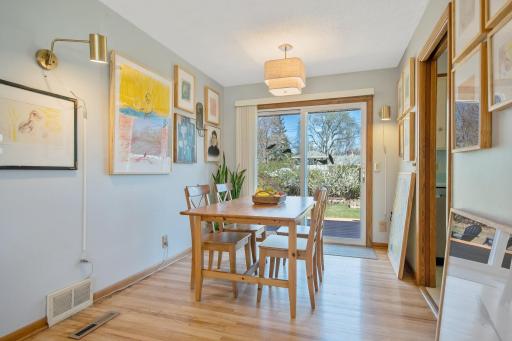 Dining Room with Sliding Glass Door onto backyard Deck