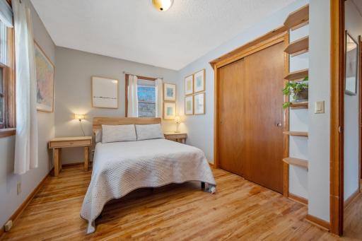 Primary Bedroom with Walk In Closet and Built-Ins
