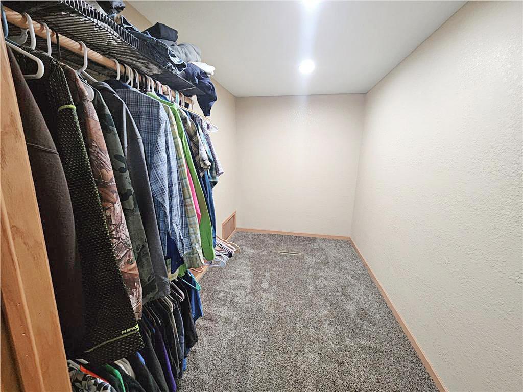 Walk-in closet off master bedroom