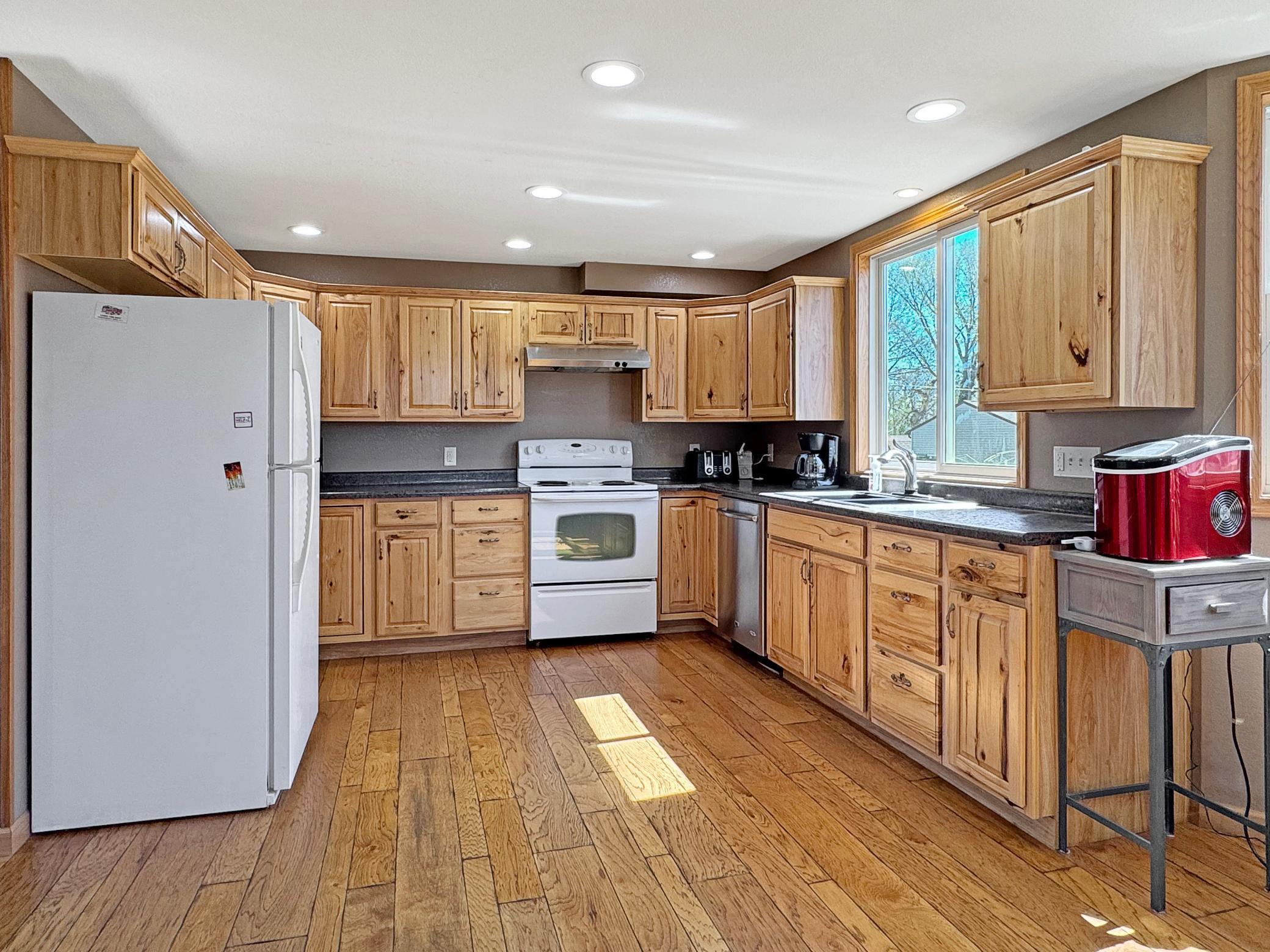 Kitchen boasting Hickory cabinets
