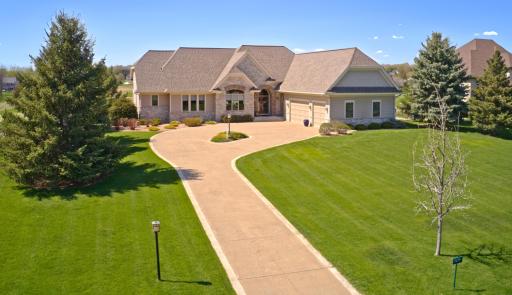 309 Lindsay Rd, Hudson, WI, is located directly on the prestigious Troy Burne Golf Course