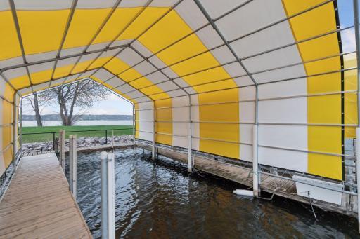 A newer LAKE MINNETONKA 32 FT dock is dedicated to the condo address of 5420 Three Points Blvd, #232, Mound MN 55364