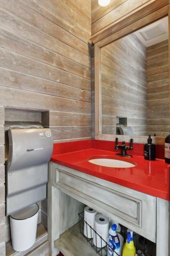 Complete with half bath for vendors or guests!