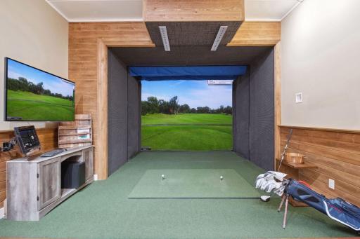 ...complete with golf simulator!!