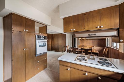 Pantry Closet and Wall Oven, with Cooktop in the Kitchen