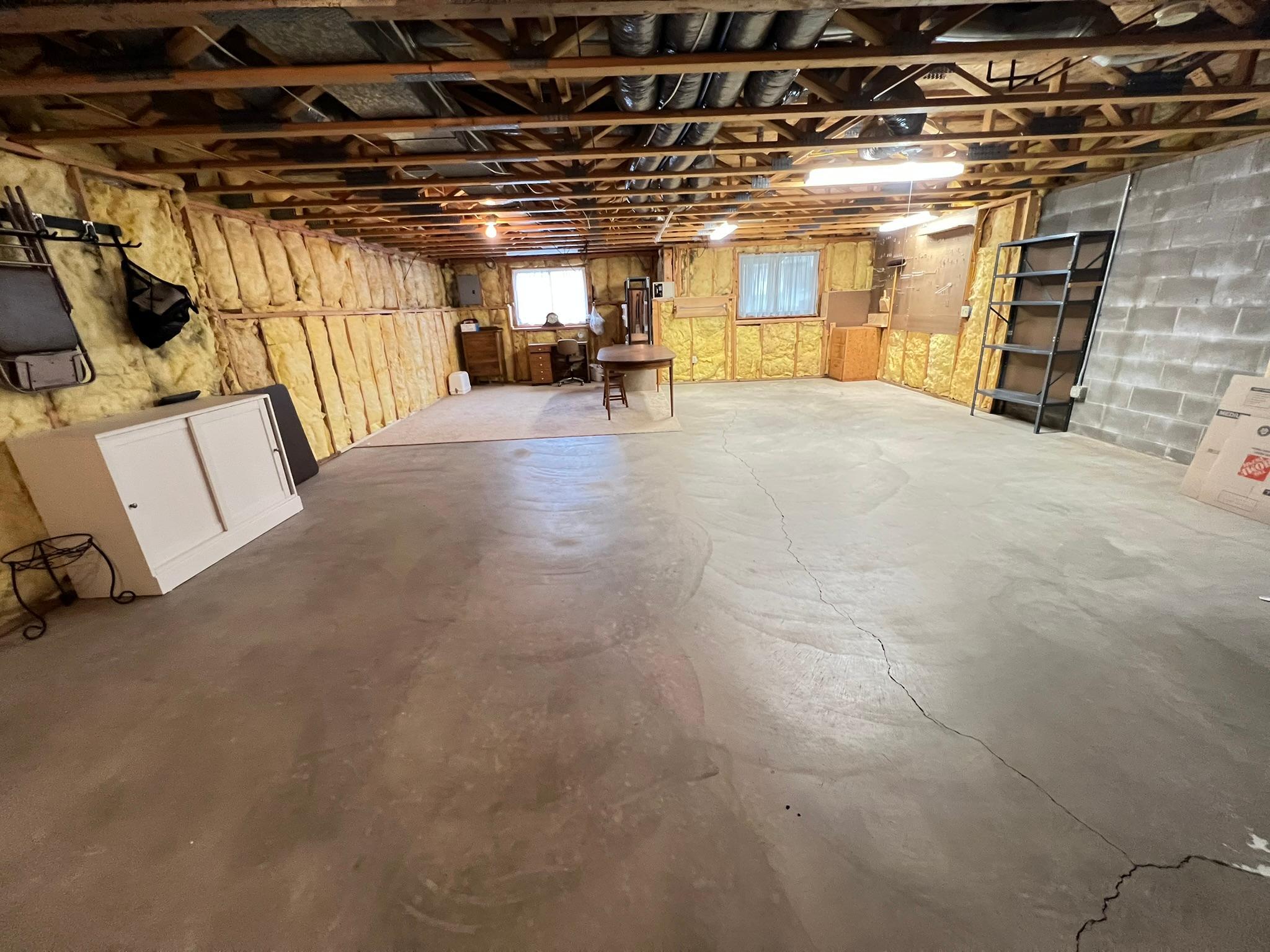 Huge un-finished lower level that could have 2 more BR"s, also has rough-in for future bath.