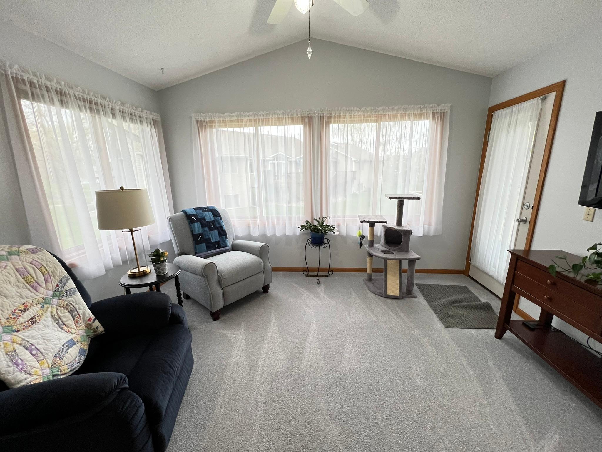 Sun room that walks-out to deck.
