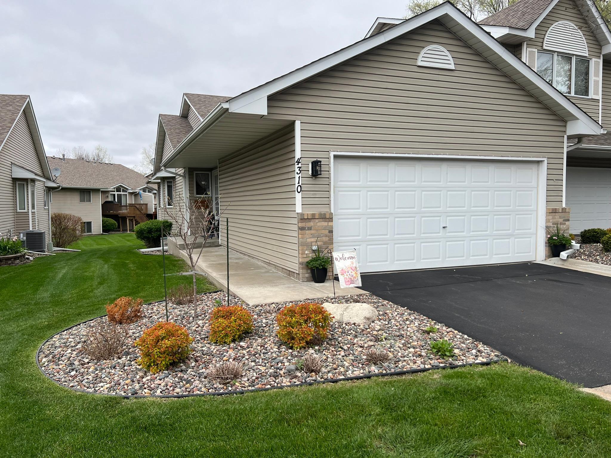 Wonderful end unit Rambler Townhome in model condition.