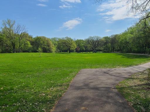 Path through Hidden Hollow Park leads to playground, picnic area, Bellaire Beach and the Lake Links Trail system