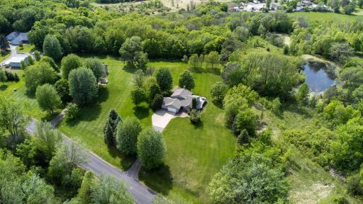 Welcome home to your private sanctuary situated on 4 acres!