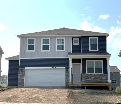Welcome to the Holcombe! *Photo is of the actual home for sale! Notice the 2.5 car garage!