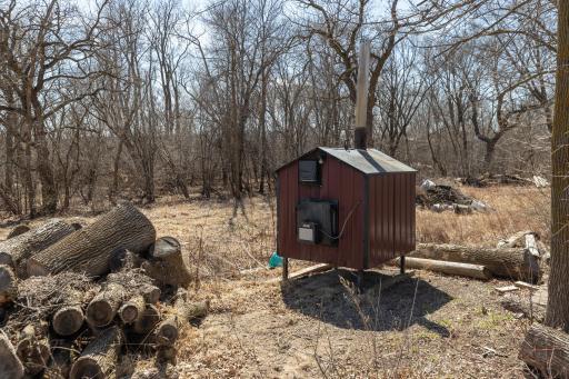 Wood Furnace with plenty of logs for free heat