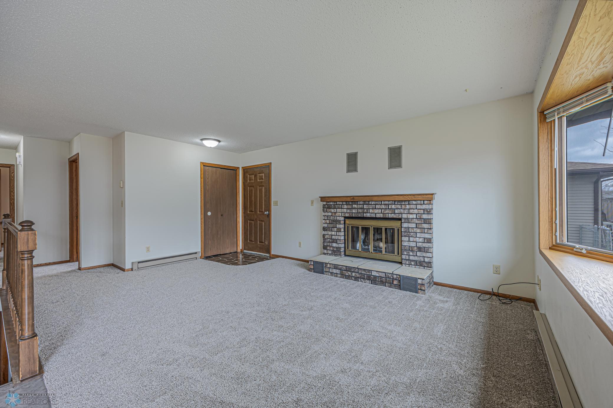 Front Door and Living Rm Wood FP