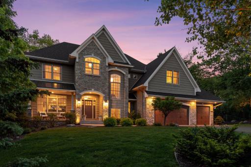 Nestled on a private 0.65 acre lot with pond views, this stunning two-story boasts five bedrooms and five bathrooms across 4,694 finished square feet.